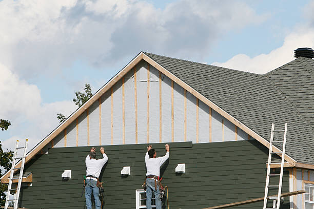 Professional Siding technician working in Addison, TX
